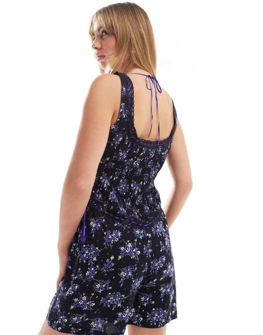 ASOS DESIGN lace trim button through spun playsuit in navy floral print - Image 4