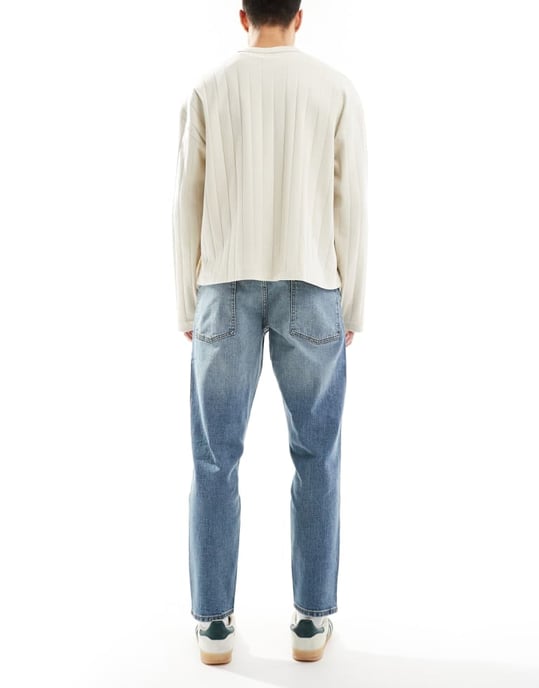 ASOS DESIGN stretch tapered jeans in mid wash blue - Image 2