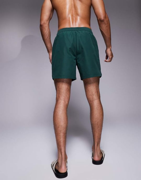 ASOS DESIGN swim shorts in mid length with embroidery in green - Image 4