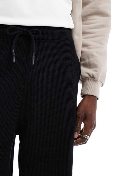 ASOS DESIGN oversized shorts in waffle texture in black - Image 3
