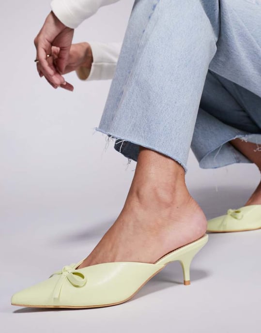 Public Desire Wide Fit Lionheart pointed kitten heel mules with bow in yellow - Image 4
