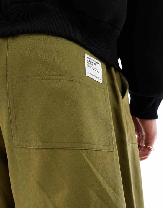 ASOS DESIGN oversized baggy-byxor med knäpaneler i grön - Image 3