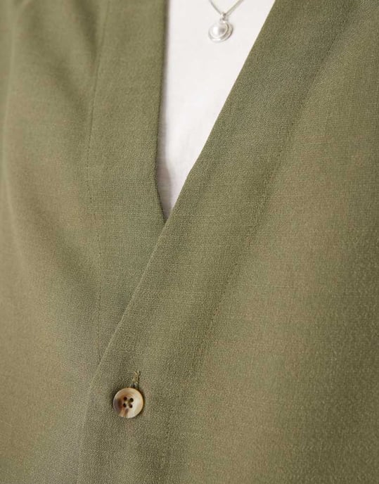 ASOS DESIGN sleeveless deep V neck regular shirt in khaki - Image 2