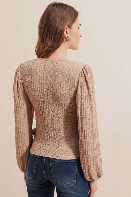 Texturerad V-ringad Blus med Pompom och Knutstängning - Image 6