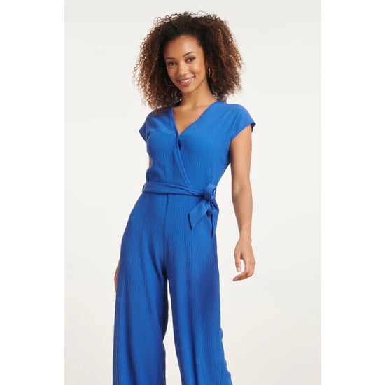 Smashed Lemon Blauwe jumpsuit met overslag v-hals en tailleceintuur | - Image 3