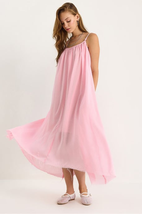 Solid Spaghetti Strap Muslin Midi Dress with Sheer Hem - Image 1