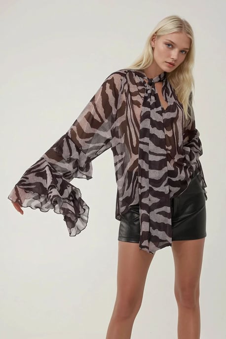 Blus med volangdetalj i zebramönster - Image 1