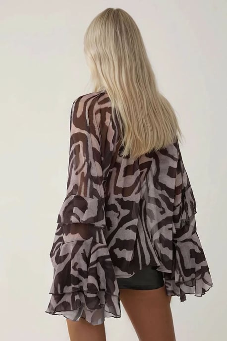 Blus med volangdetalj i zebramönster - Image 5