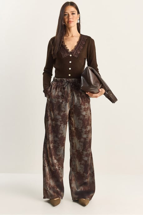 Hög midja vida byxor med mönster och bindningsdetalj - Image 1