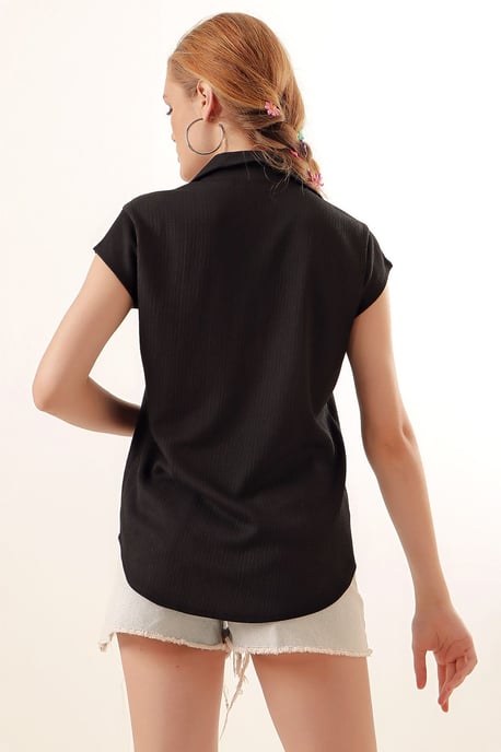 Texturerad polotröja blus med knäppning - Image 5