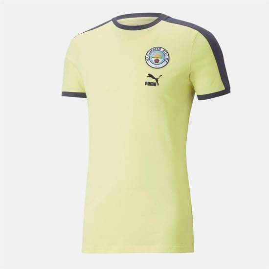 Men's Puma City Fc Ftblheritage T7 T Shirt in Yellow - Image 1