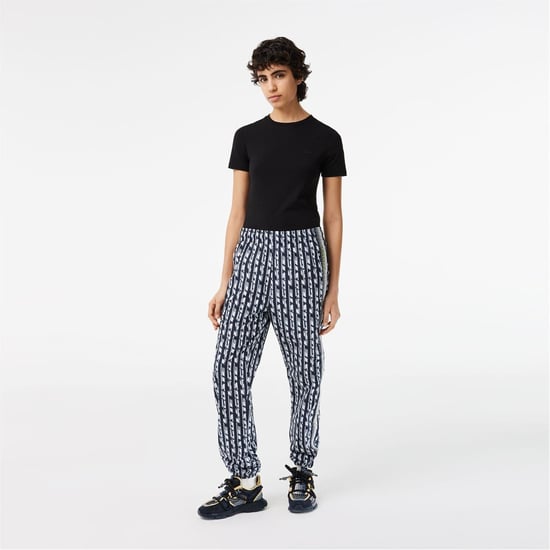 Women's Lacoste Lettering Vertical Stripe Slim Cut Joggers in Black/Blue - Image 1