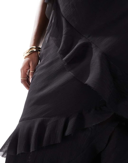ASOS DESIGN Curve asymmetric shoulder bias cut maxi dress with ruffle details in black - Image 4