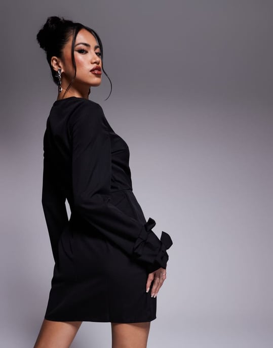 In The Style x Perrie Sian exclusive structured long sleeve bow detail mini dress in black - Image 3