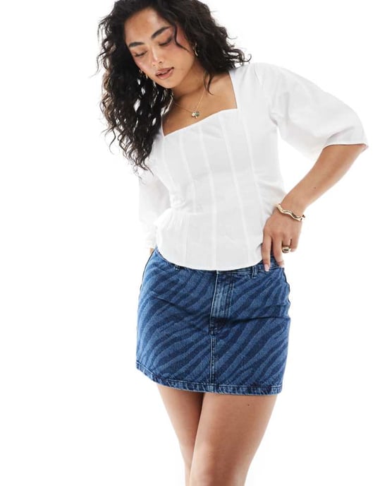 ASOS DESIGN denim mini skirt with zebra laser - Image 1