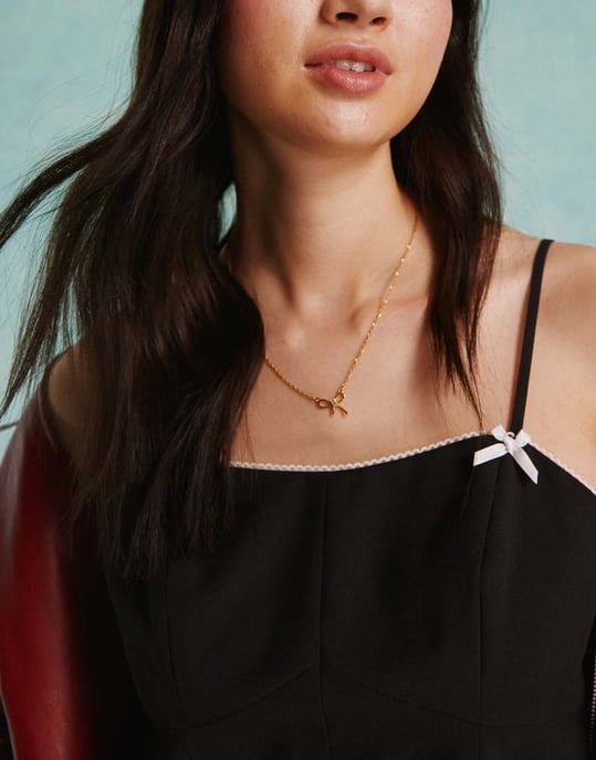 Miss Selfridge figurnära korsettopp med rosett i svart - Image 2
