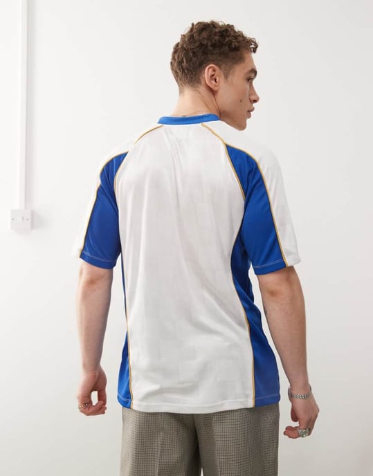 Umbro panelled jersey t-shirt in white and blue - Image 2