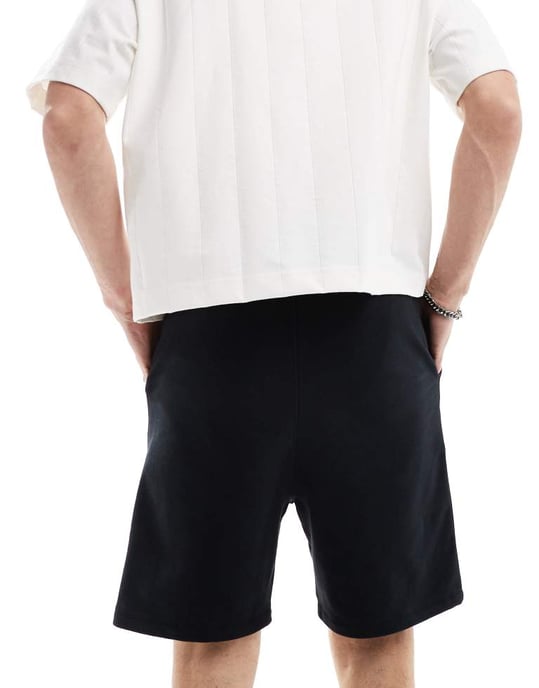 ASOS DESIGN slim fit arbetsshorts med framfickdetalj i svart - Image 3