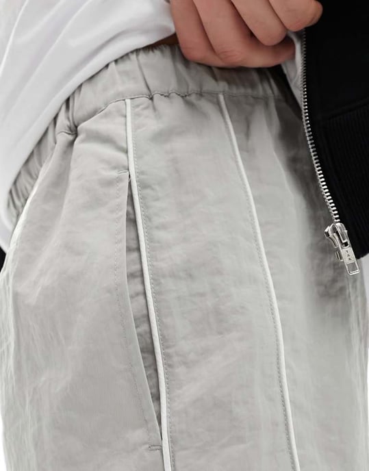 ASOS DESIGN slim nylon shorts med pipingdetalj i sten - Image 4