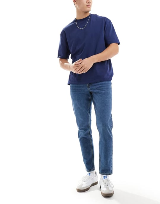ASOS DESIGN stretch tapered jeans in dark wash blue - Image 3