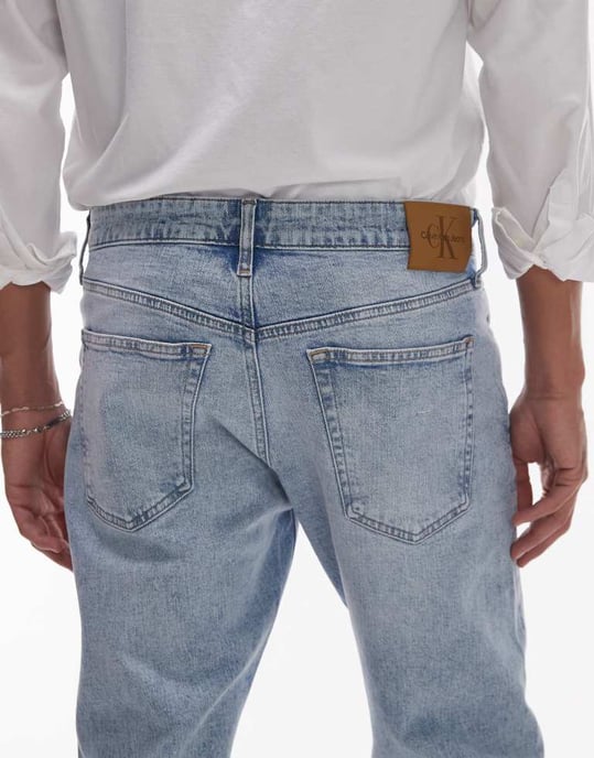 Calvin Klein Jeans slim tapered jeans in light wash - Image 4