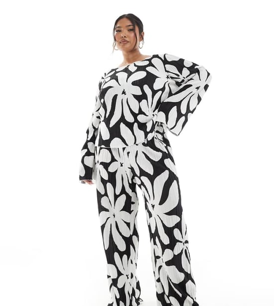 Vero Moda Curve high waist wide leg plisse trouser in monochrome floral print - Image 1