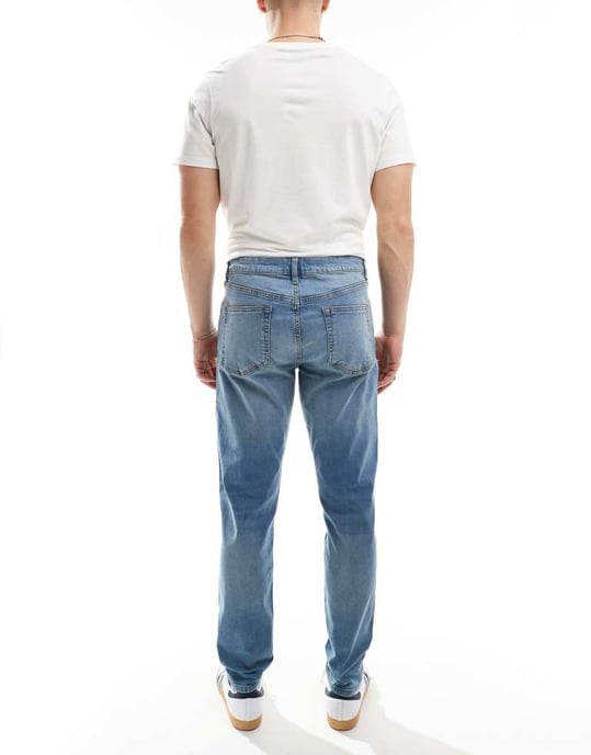 ASOS DESIGN skinny jeans med gul nyans i mellanblå tvätt - Image 2