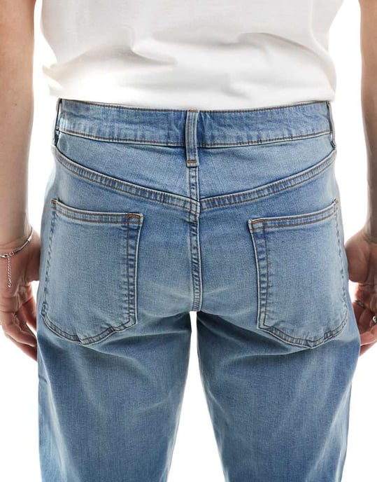 ASOS DESIGN skinny jeans med gul nyans i mellanblå tvätt - Image 4