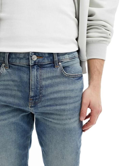 ASOS DESIGN smala jeans med ton i ljustvättad blå - Image 4