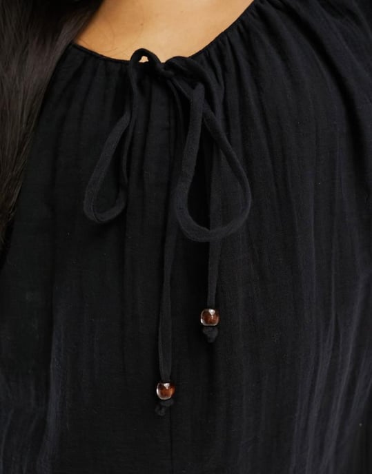 ASOS DESIGN långärmad jumpsuit med pärldetaljer i svart - Image 3