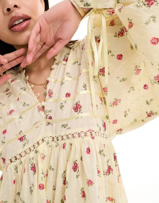 ASOS DESIGN Lace trim playsuit with full flippy shorts in ditsy print - Image 3