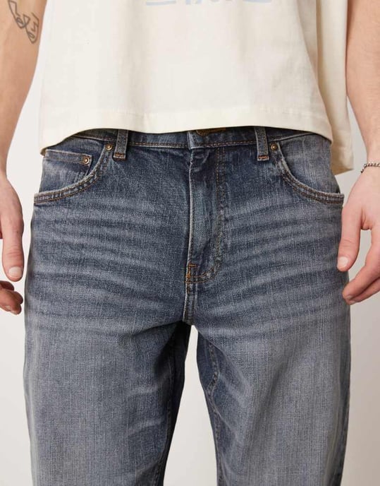 ASOS DESIGN stretch tapered jeans i medtvättad blå - Image 4