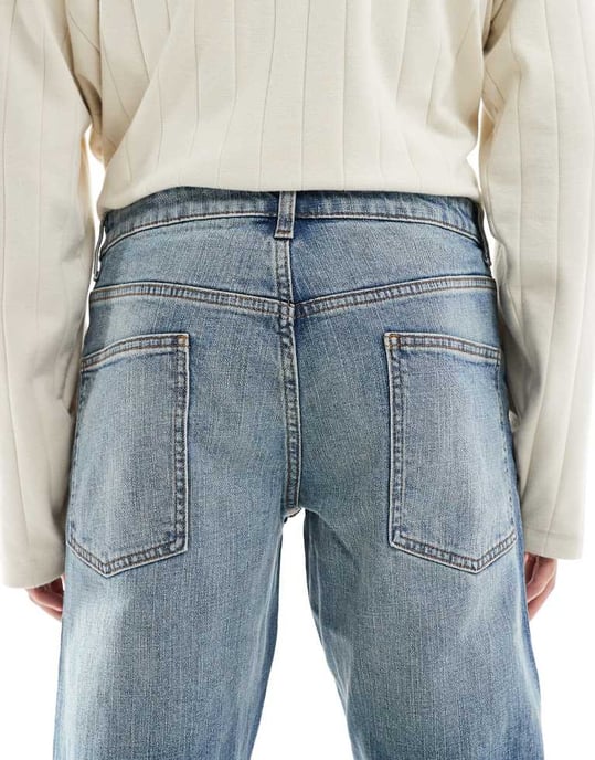 ASOS DESIGN stretch tapered jeans i medtvättad blå - Image 4
