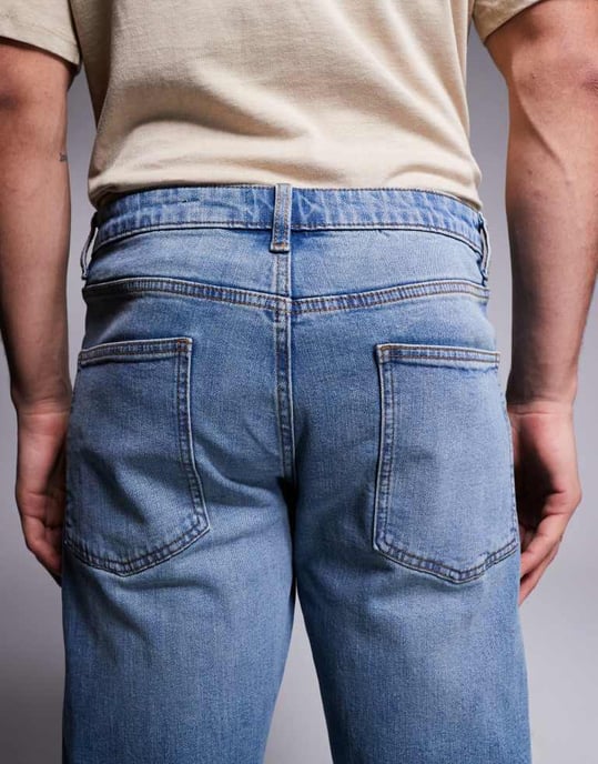 ASOS DSIGN stretch tapered jeans i mellan tvätt med vintageskugga - Image 4