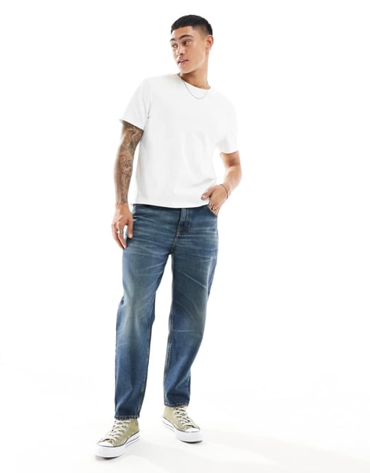 ASOS DESIGN tapered jeans i mörk tvättad blå - Image 1