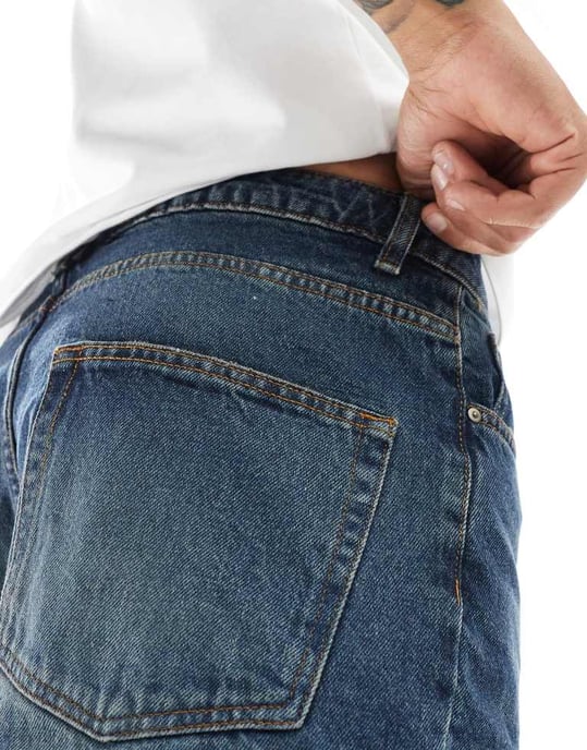 ASOS DESIGN tapered jeans i mörk tvättad blå - Image 2