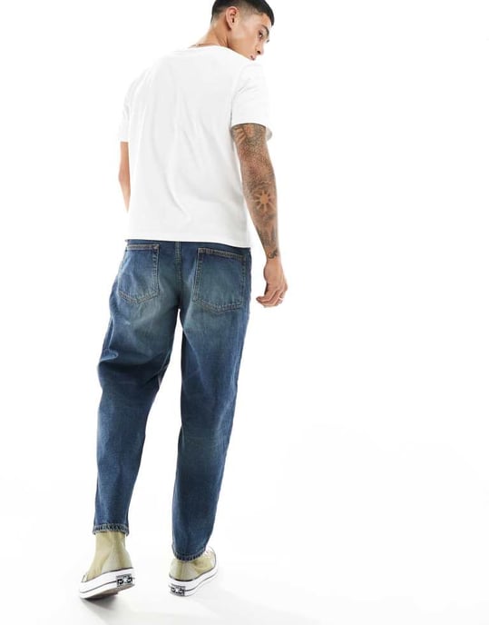 ASOS DESIGN tapered jeans i mörk tvättad blå - Image 4