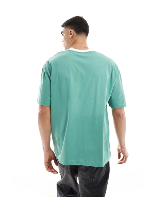 ASOS DESIGN oversized t-shirt med v-ringning i grönt med Philadelphia-print - Image 3