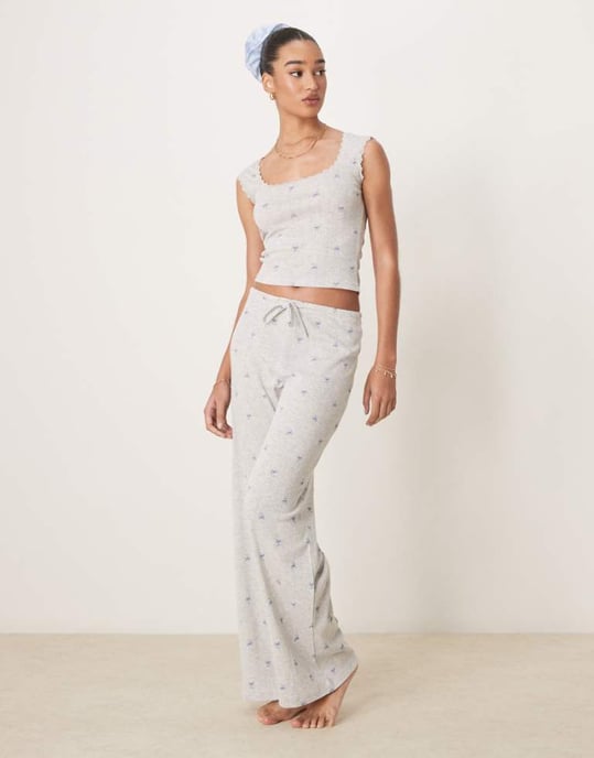 Gina Tricot mix and match pointelle embroidered edge cotton pyjama bottoms with blue bows in grey melange - Image 1