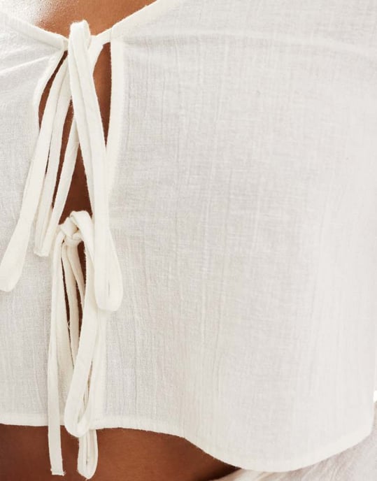 ASOS DESIGN Kayla mixa och matcha långärmad strandtop med knytframskärning i vitt - Image 3