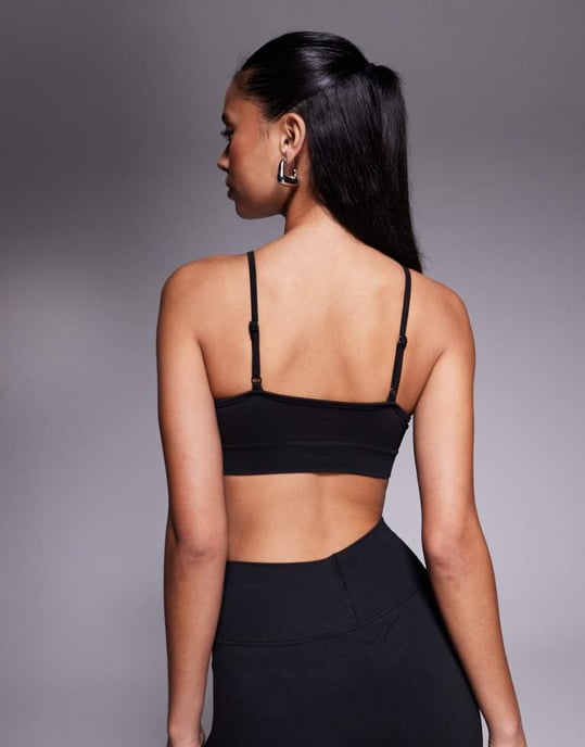 4505 wrap front seamless light support sports bra in black - Image 2