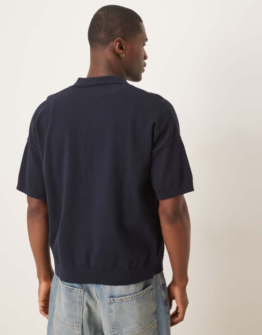 ASOS DESIGN relaxed lightweight knitted cotton button through polo in navy - Image 4