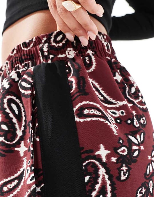ASOS DESIGN pull on trousers with contrast panel in dark cherry bandana print - Image 3