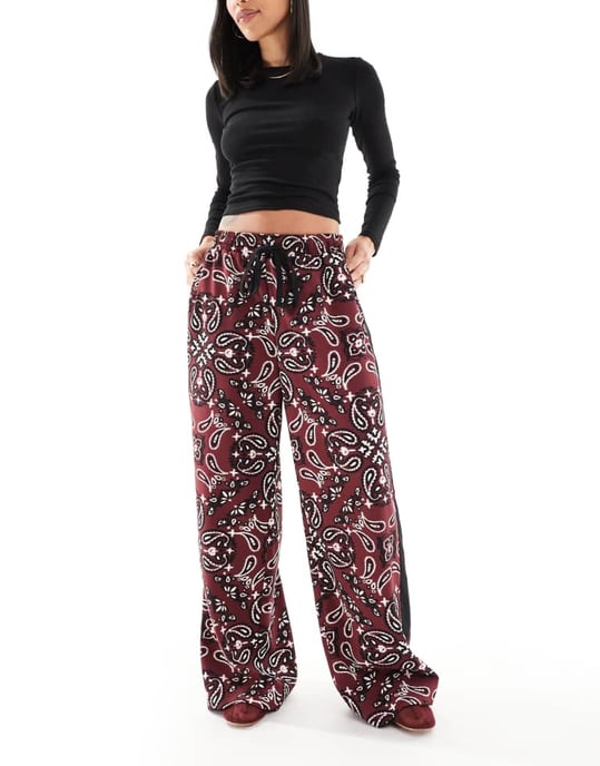ASOS DESIGN pull on trousers with contrast panel in dark cherry bandana print - Image 4
