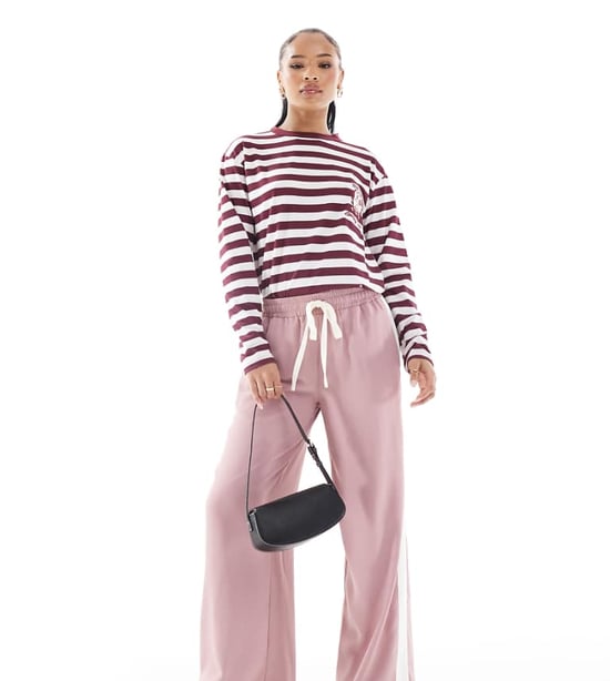 ASOS DESIGN Petite pull on trousers with contrast panel in pink - Image 1