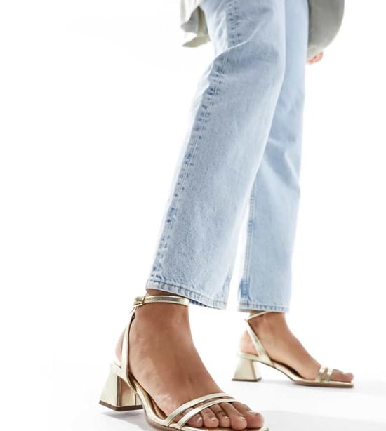 ASOS DESIGN Wide Fit Honeydew mid block heeled sandals in gold - Image 1