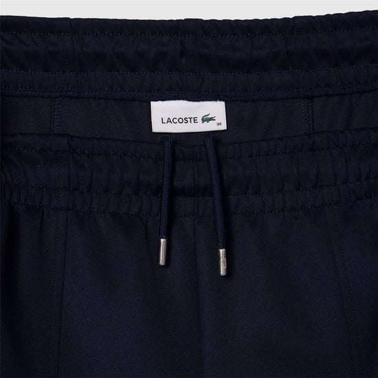 Women's Lacoste Interlock Joggers Tracksuit Bottoms in Blue - Image 3