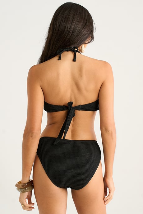 Bikinitopp med halterneck och svarta solmönster - Image 4