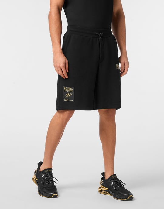 Short Cargo Pants Laminated - Image 2