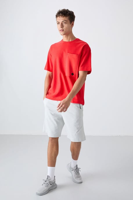 Överdimensionerad T-shirt i bomullsmix med rund hals och ficka - Image 2